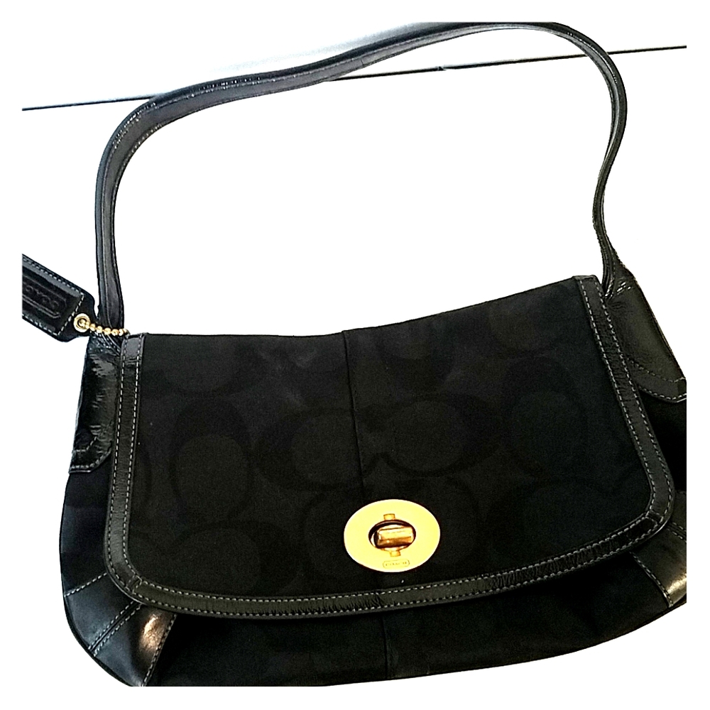 Black COACH shoulder bag.